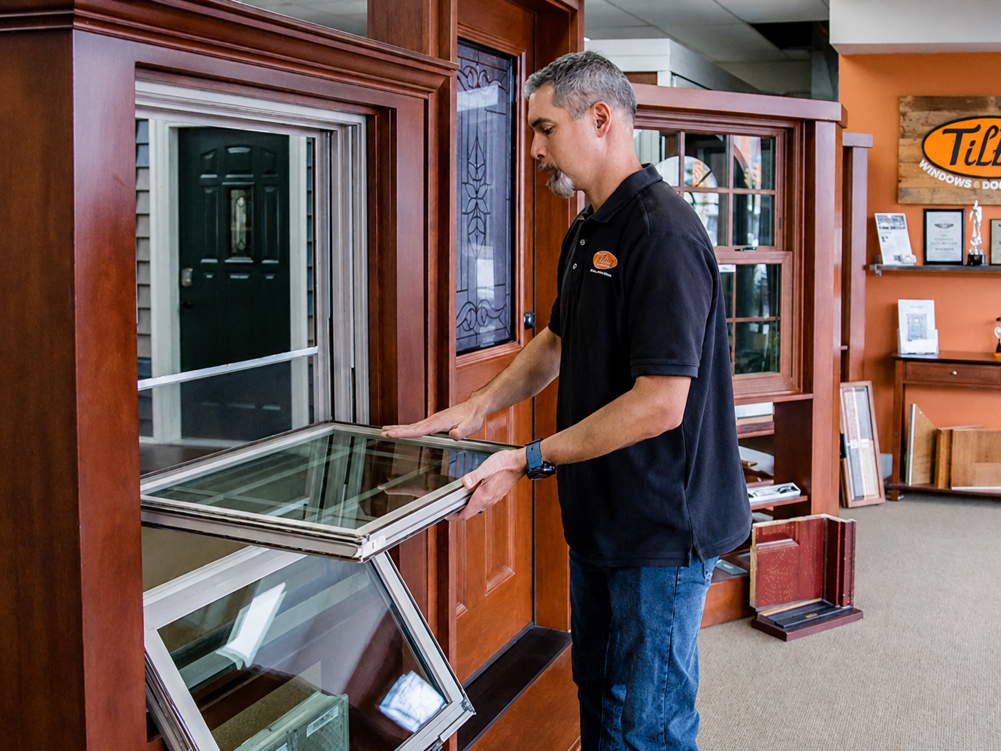 Javier Cardona demonstrating a replacement window in the Tiltin showroom